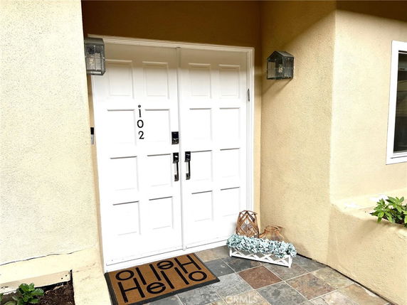 Front view of a house entrance with double doors