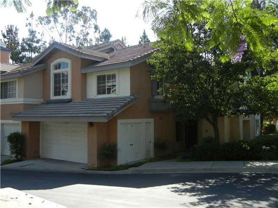 Front view of a two-story house with a double garage.