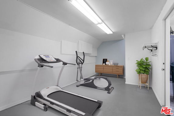Indoor gym with treadmill and exercise bike