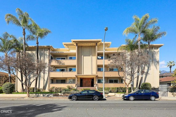 Front view of a multi-story residential building.