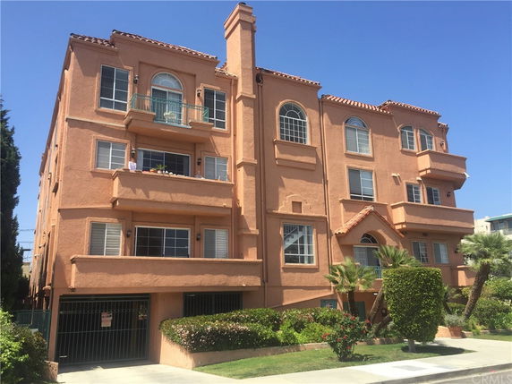 Front view of a multi-story residential building.