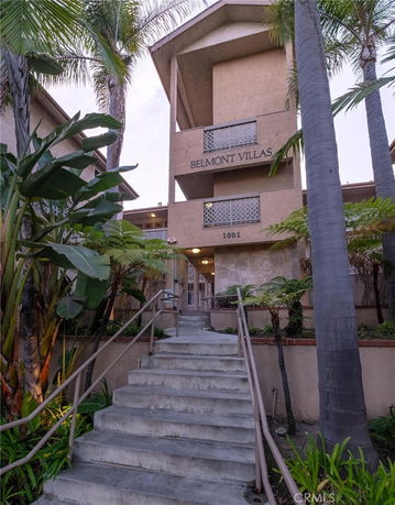 Front view of a multi-story building named Belmont Villas.