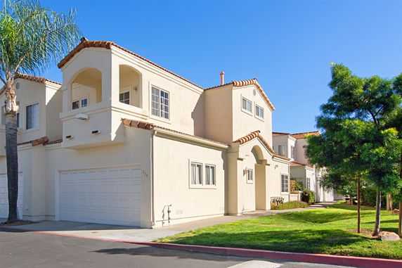 Front view of a two-story house with a double garage.