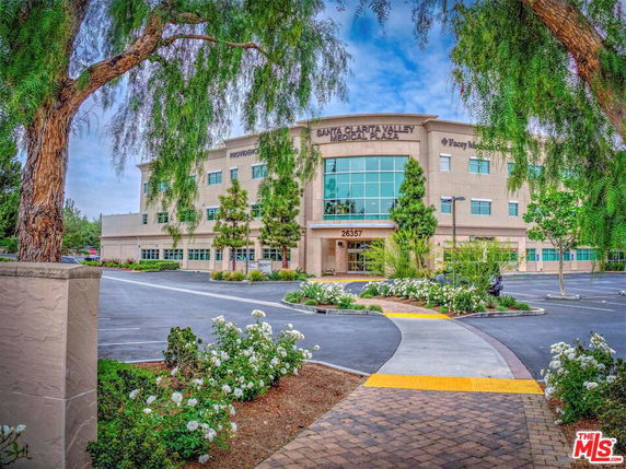 Front view of a three-story medical plaza building.