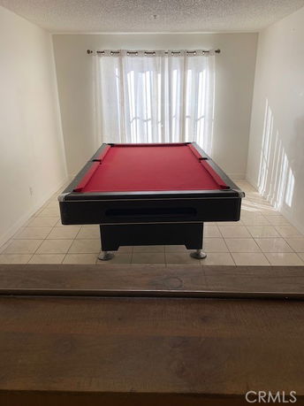 Interior view of a room with a billiards table.