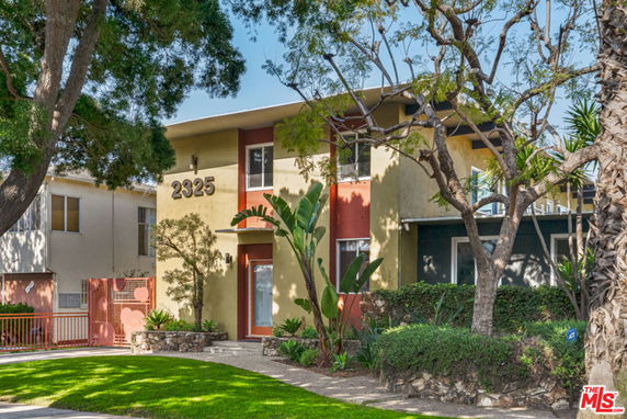 Front view of a two-story residential building with the number 2325.