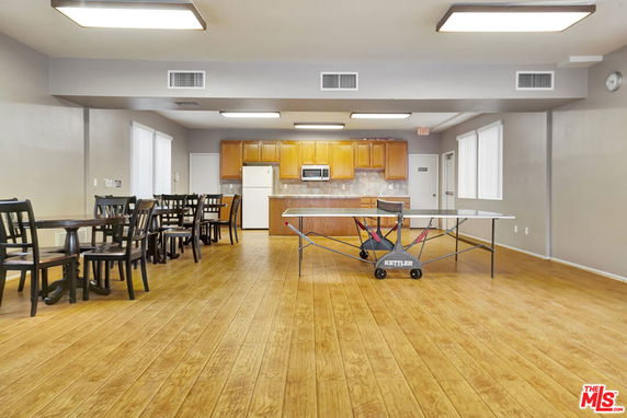Recreation area with ping pong table and kitchen