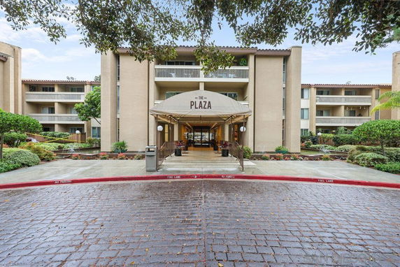 Front view of a multi-story building labeled 'The Plaza'.