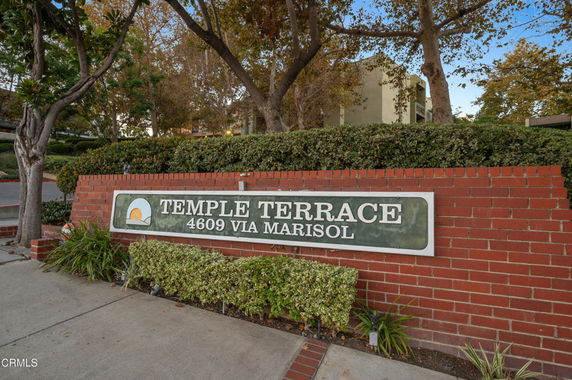 Front view of a residential complex with a sign reading 'Temple Terrace 4609 Via Marisol'.
