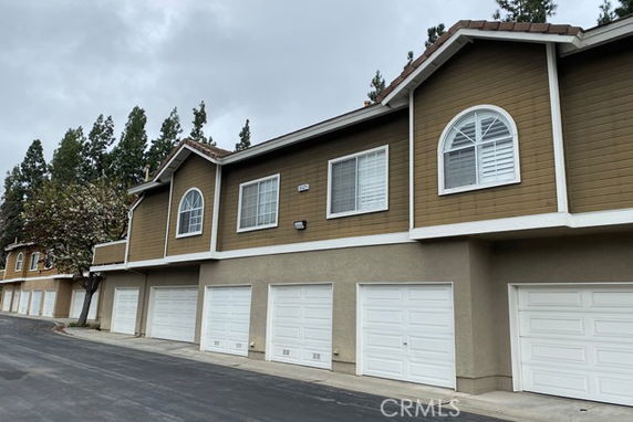 Front view of a building with multiple garage doors.