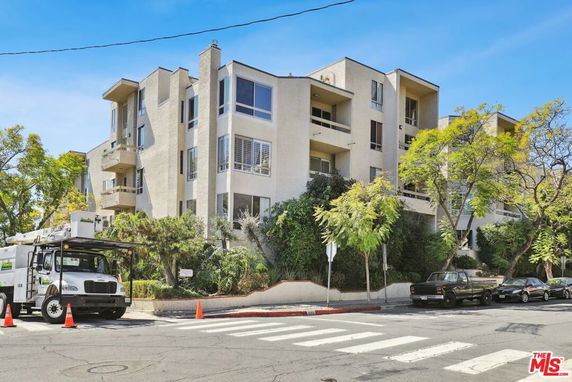 Front view of a multi-story apartment building.