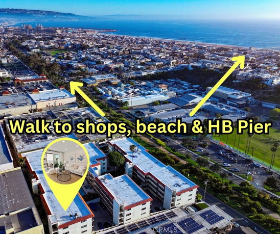 Aerial view of buildings near the beach with a highlighted route to shops and HB Pier.