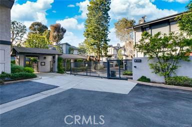 Front view of a gated entrance to a residential complex.