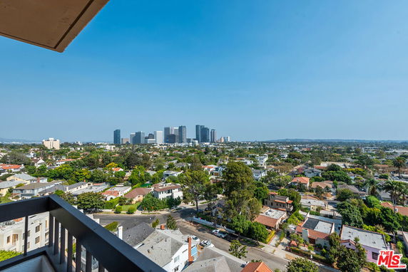 Panoramic view of urban area with high-rise buildings in the distance.