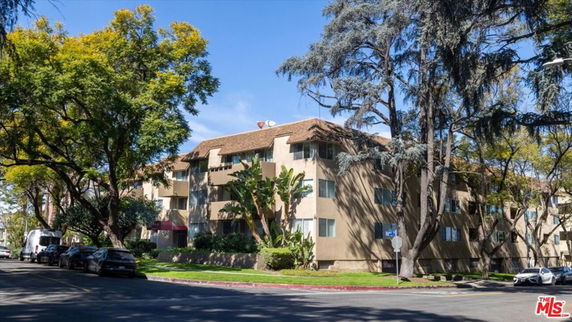 Front view of a multi-story apartment building.