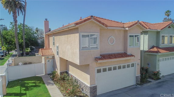 Front view of a two-story house with a double garage.