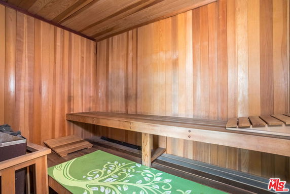 Interior of a wooden sauna room with benches.