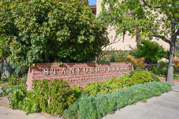 Front view of a building with brick signage reading 'Stanford Terrace'.