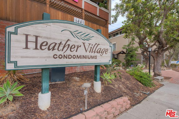Exterior view of Heather Village Condominiums sign