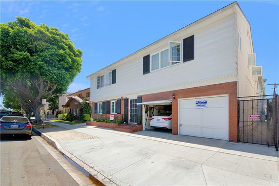Front view of a two-story house with a double garage.