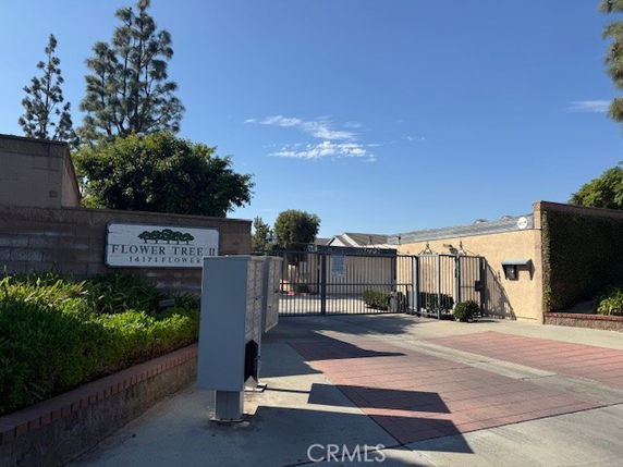 Front view of a gated residential complex entrance