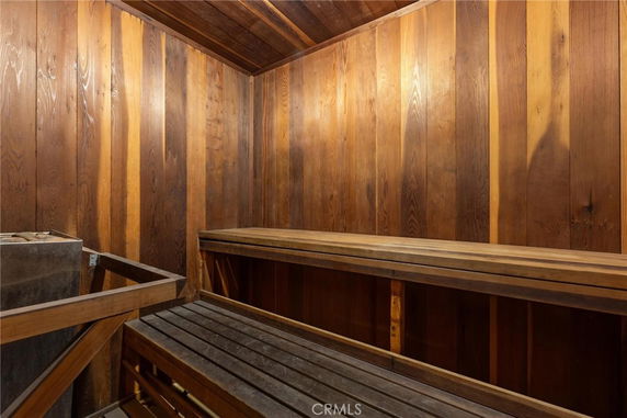 Interior of a wooden sauna room with benches.