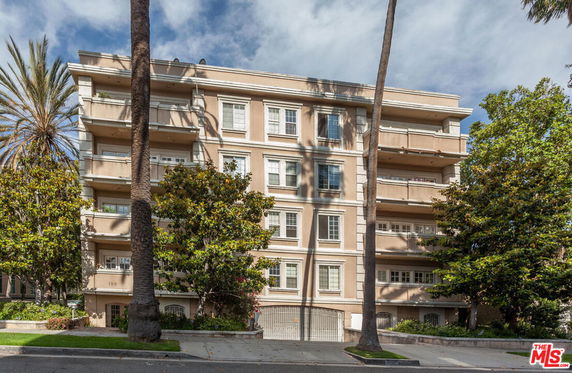 Front view of a multi-story residential building.