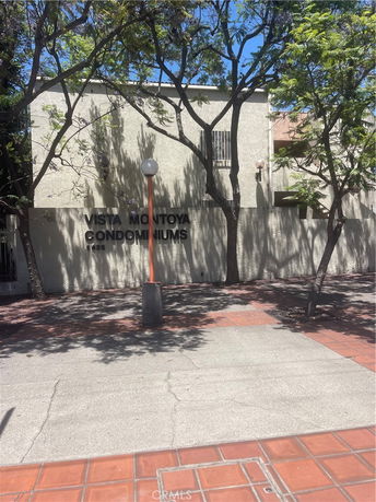 Front view of a condominium building with a visible entrance.