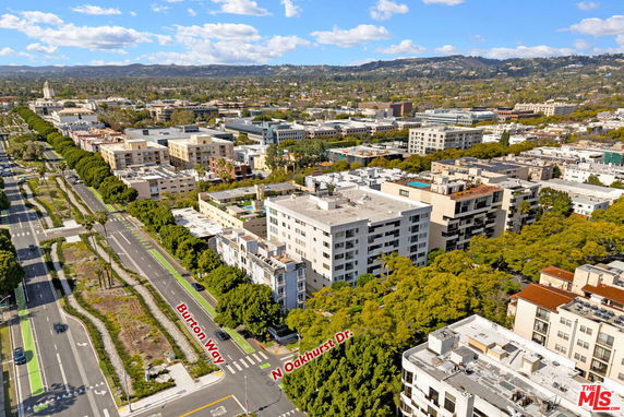Panoramic view of a city area with multiple buildings and roads.