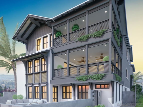 Front view of a three-story modern house with balconies and large windows.