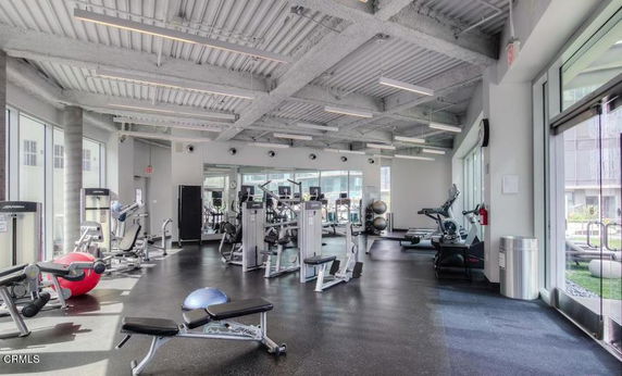 Interior view of a gym with exercise equipment.
