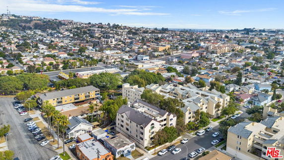 Panoramic view of a residential area with numerous houses and apartment buildings.
