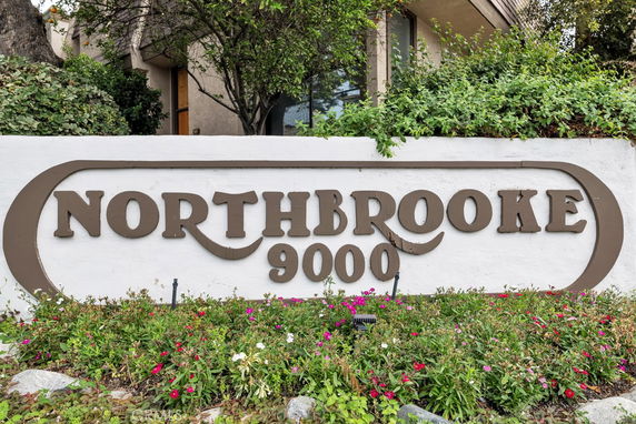 Front view of a building with a sign reading 'Northbrooke 9000'.