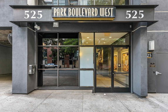 Front view of a building entrance with signage 'Park Boulevard West' and the number 525.
