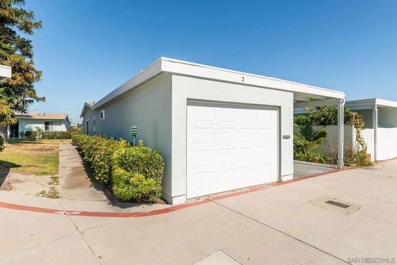 Front view of a single-story house with a garage.