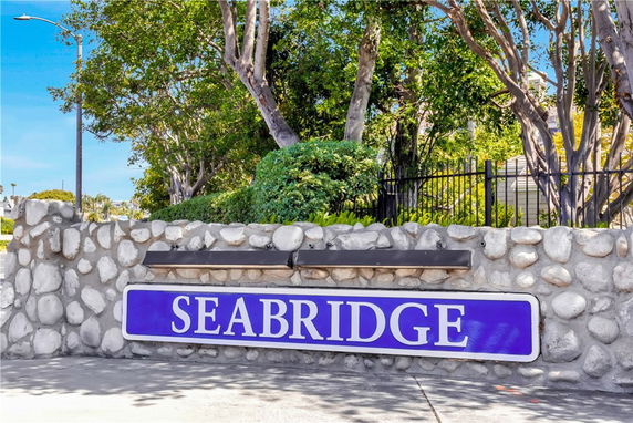 Front view of a stone wall entrance marked 'Seabridge'.