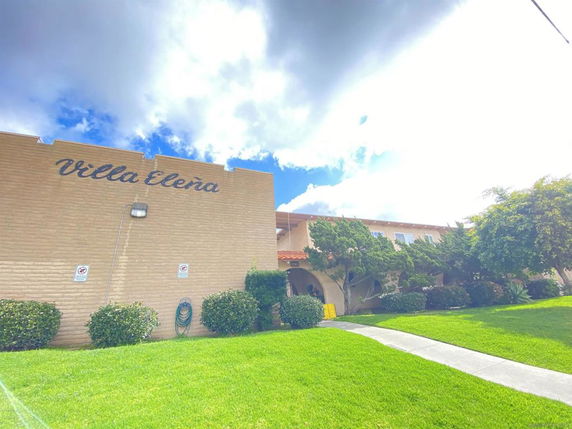 Front view of a building with 'Villa Elena' written on the facade.