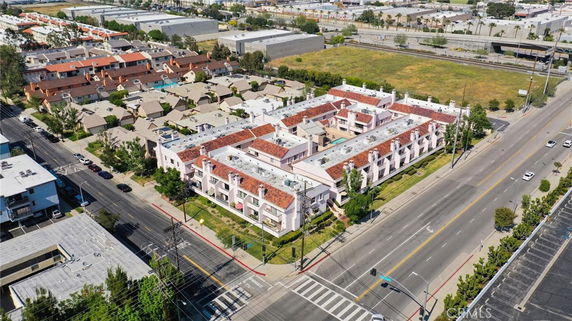 Aerial view of a residential complex with multiple buildings and surrounding streets.
