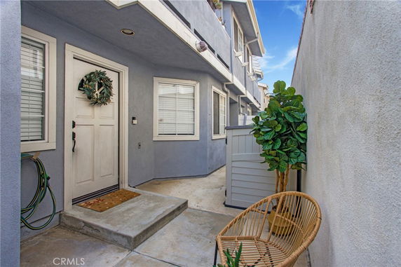 Front view of a house entrance with a small porch area.