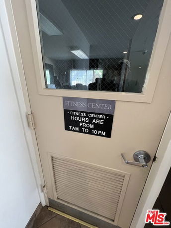 Door leading to a fitness center.