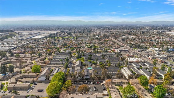Aerial view of a residential neighborhood with numerous houses and buildings.