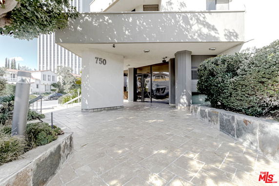 Front view of a building entrance with the number 750 displayed.