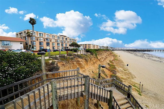 View of beach and buildings from a higher elevation.
