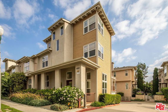 Front view of a multi-story residential building.