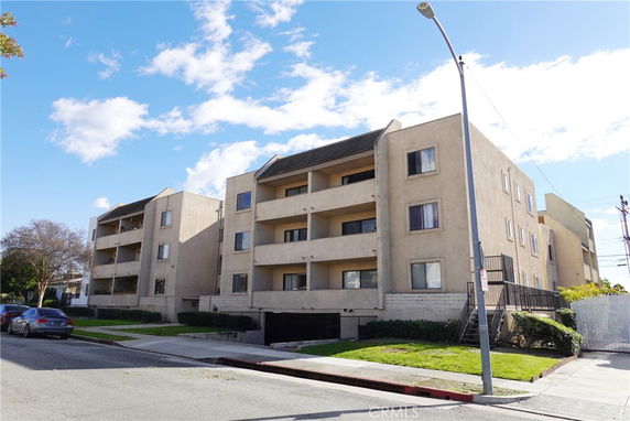Front view of a multi-story apartment building.