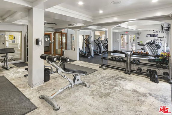 Indoor gym with exercise equipment and weights