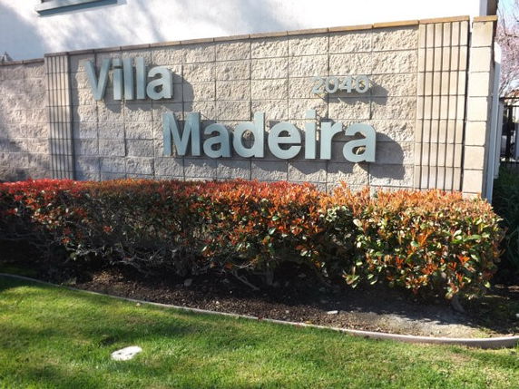 Front view of a building sign reading 'Villa Madeira'.