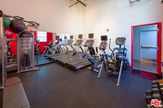 Indoor gym area with treadmills and exercise equipment.