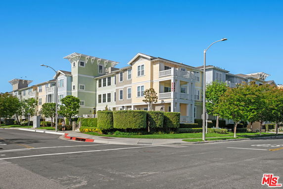 Front view of a multi-story apartment building.