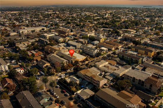 Aerial view of a densely built neighborhood with multiple residential buildings.